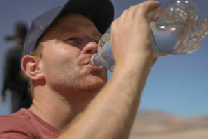 a man drinks water
